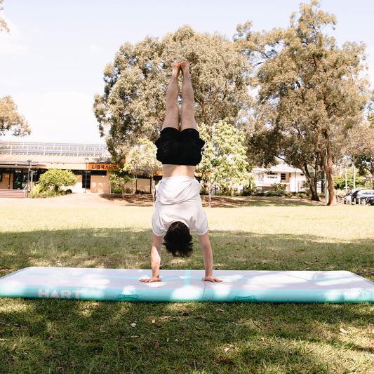 10 Fun and Safe Activities to Do on an Air Track: Gymnastics, Flips, Yoga & More