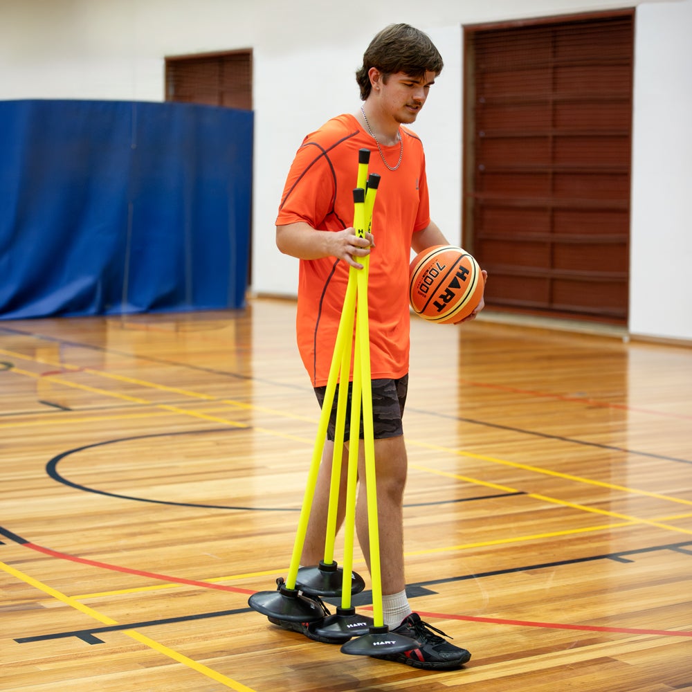 HART Safety Agility Pole Set with multiple colorful poles for training and agility exercises, laid out on a surface.
