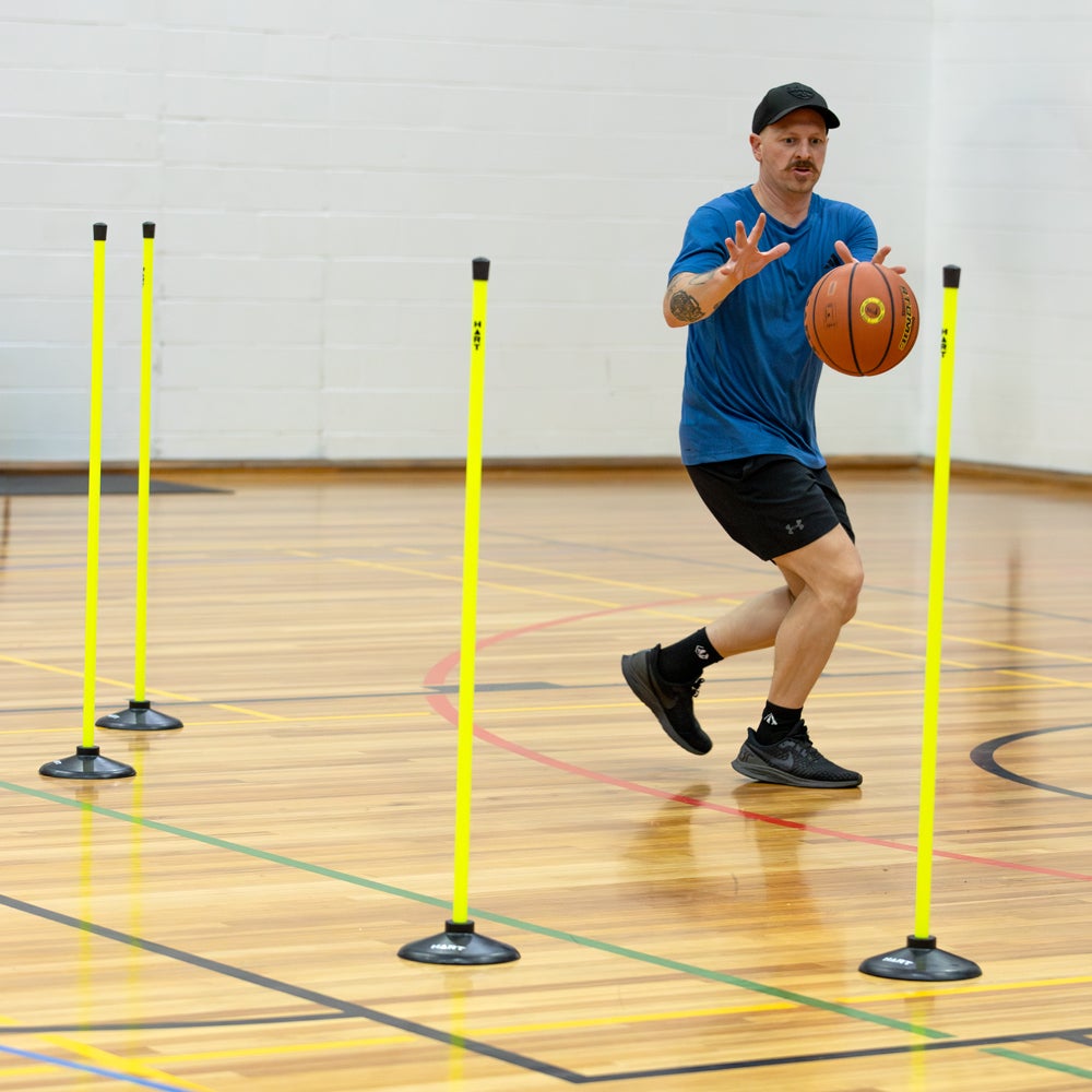 HART Safety Agility Pole Set with multiple orange poles and bases for agility training and safety drills.