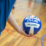 HART Club Volleyball showing a close-up view of the white and blue volleyball with brand logo and textured surface.