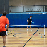 HART 2-in-1 pickleball and tennis net set with adjustable height and durable netting for outdoor sports.