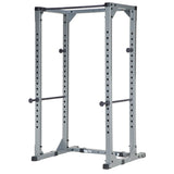 HART Power Rack for strength training with adjustable safety bars and multiple weight storage options.