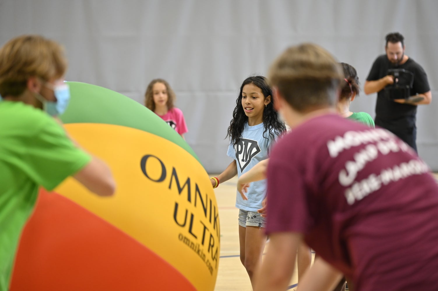 HART OMNIKIN Ultra Fun Ball, vibrant rubber ball for outdoor play, featuring bright colors and durable design.