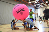 Pink HART official KIN-BALL, a large fun ball for active play, shown hitting the ground in this image.
