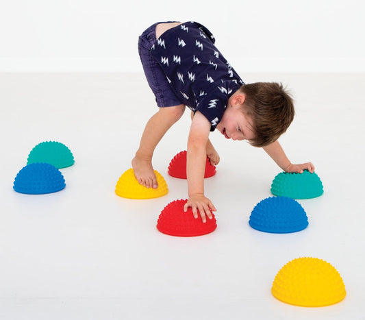 Set of four HART Sport foot pods, including discs and wobble boards, designed for balance and stability training.