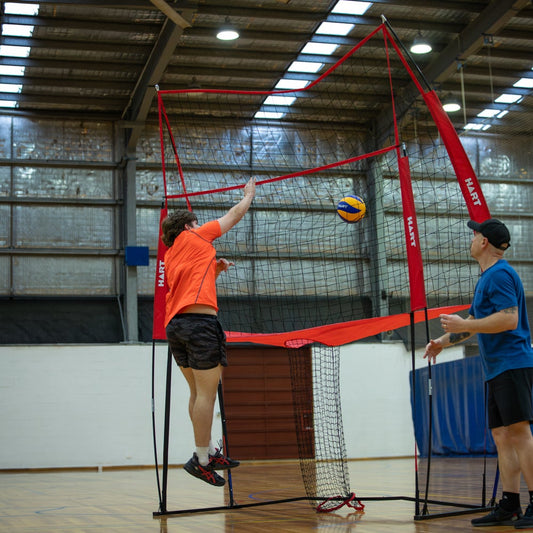 HART Sport volleyball practice station with adjustable height and sturdy frame, ideal for training and drills.