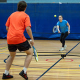 HART Sport rolling badminton net system with adjustable height and sturdy posts, ideal for indoor and outdoor courts.