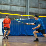 HART Big Blue Base Multi Sport System with volleyball net and posts set up for outdoor sports play.