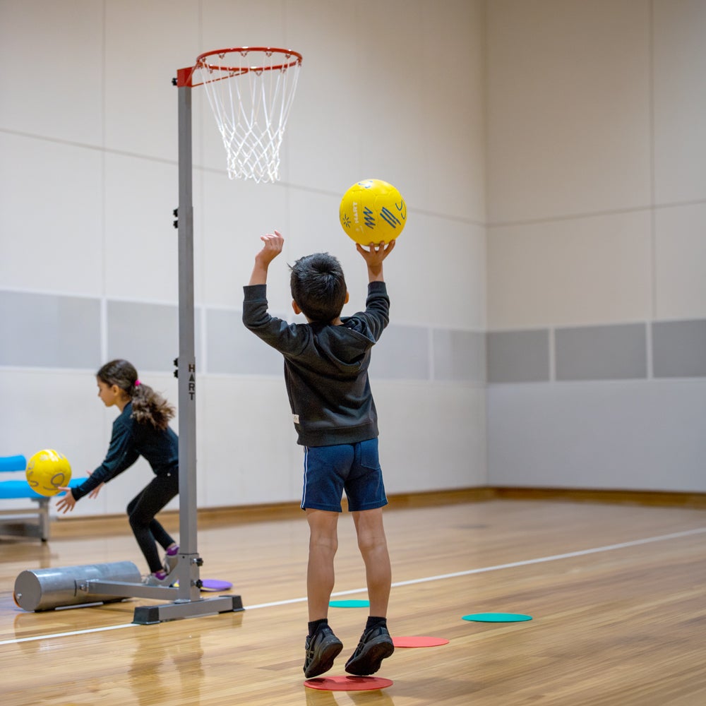 HART Netball Schools Y3-4 Starter Pack with netball accessories for young players, including balls and training gear.