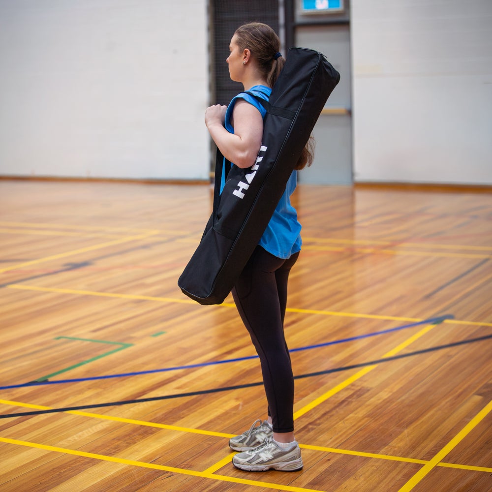 HART Sport volleyball practice station with adjustable height and training accessories, designed for effective volleyball training drills.