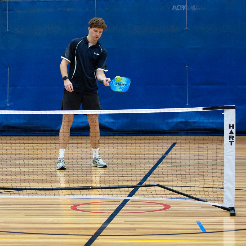HART Flex 2.0 Pickleball Paddle with ergonomic grip and vibrant design, designed for outdoor pickleball play.