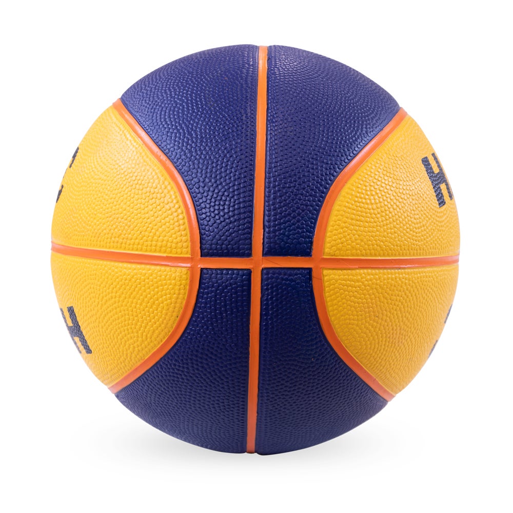 HART 3x3 basketball showing orange rubber surface with black branding and textured grip for outdoor play.