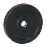 HART rubber coated regular weightlifting plates stacked on a gym floor, showing black rubber coating and metal core.