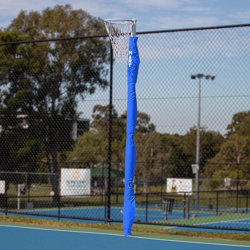 Pair of white HART Flat Netball Post Pads with 25mm thickness, designed to protect netball posts.