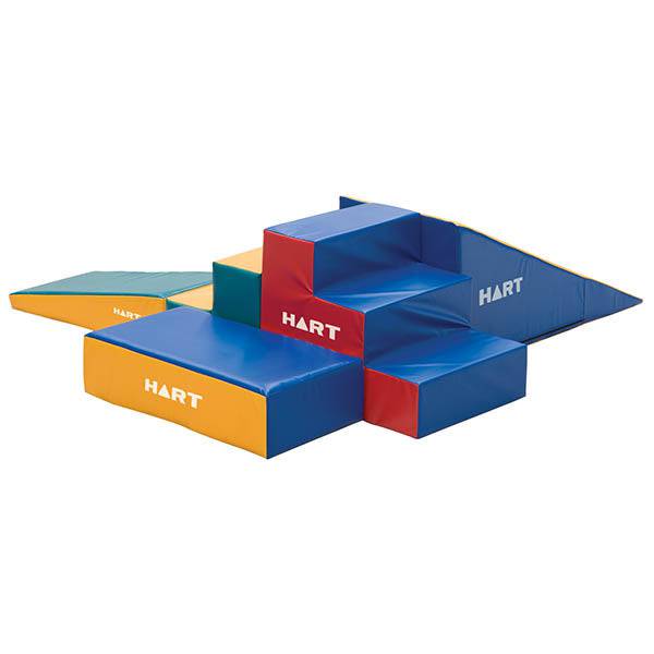 HART Play Corner Set with colorful foam tiles, soft cushions, and a small play table for kids' indoor play area.