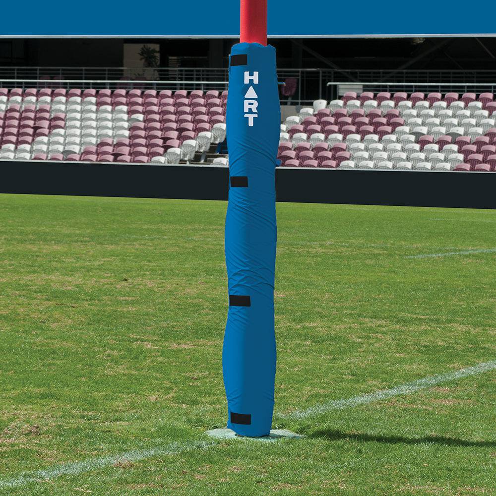 Set of four white HART flat rugby post pads attached to goal posts, providing safety and protection for rugby matches.